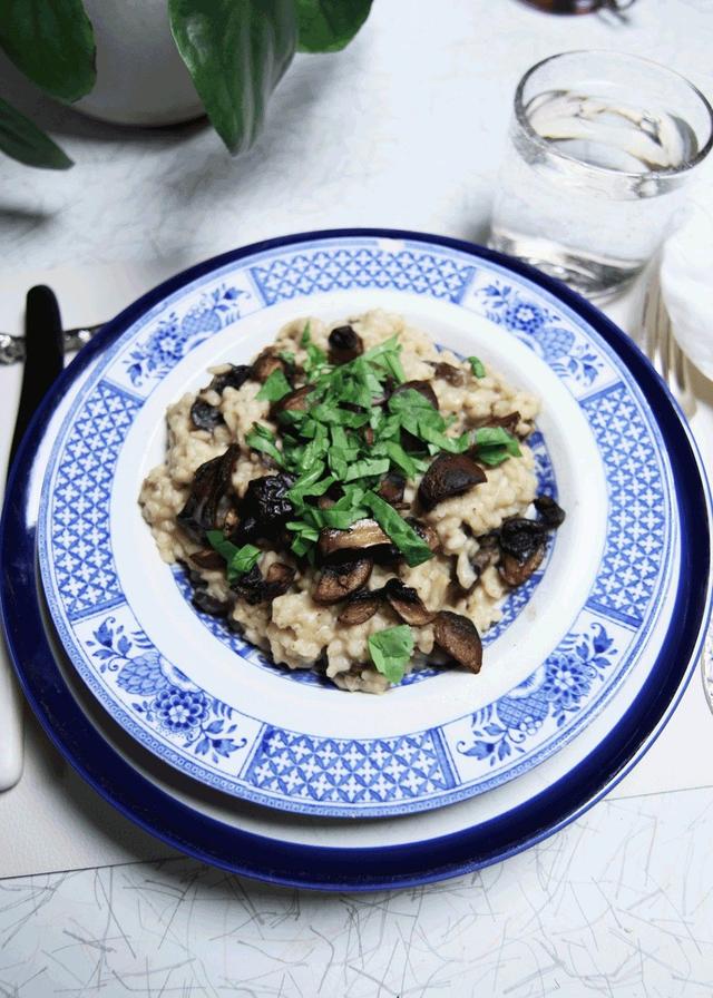Risotto on Porridge Rice with Mushrooms Leaf Parsley 