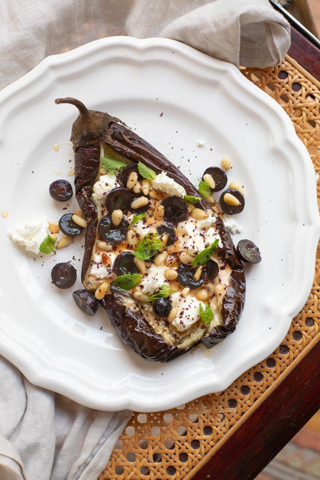 Roasted Aubergine with Tahini, Chevre, Pine Nuts and Grapes